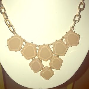 Neutral perfectly paired with white dress